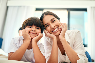 Buy stock photo Portrait of a mother and her little son bonding together at home