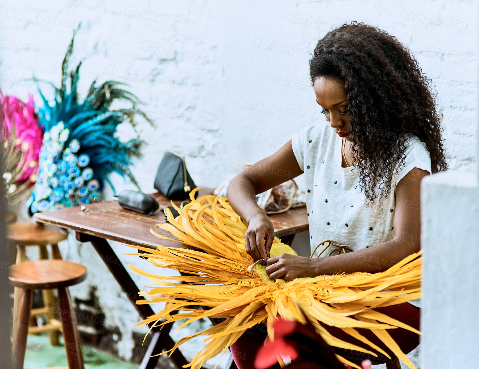 Buy stock photo Cropped shot of a beautiful dancer getting ready for a performance during carnival