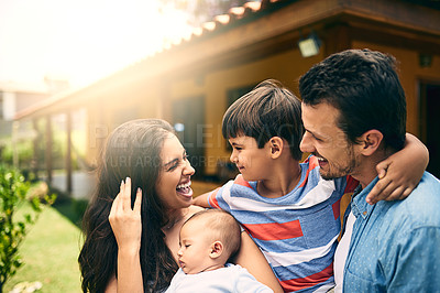 Buy stock photo Happy family, smile or hug with children bonding or relaxing together on holiday weekend in backyard. Indian mother, father or kids outside home smiling or hugging a newborn baby with happiness 