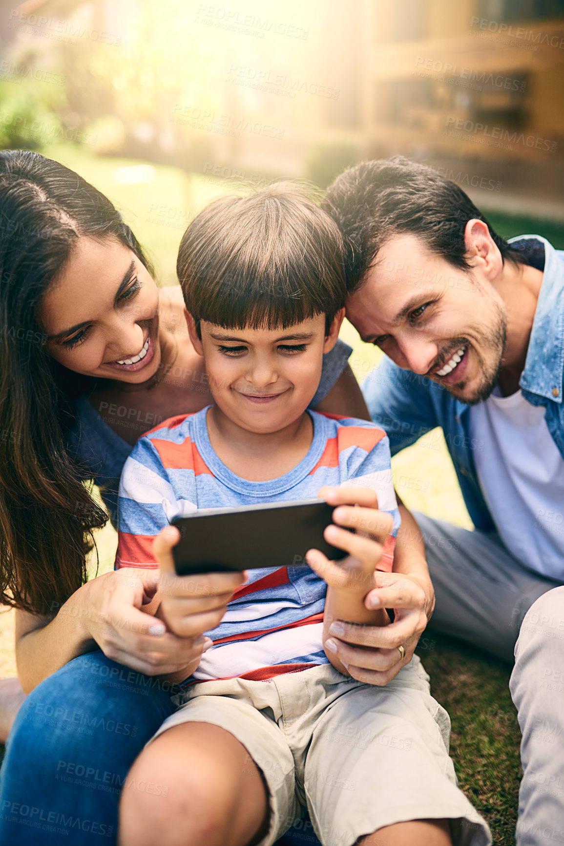 Buy stock photo Parents, child and happy with selfie in garden for profile picture update, social media post and memory in home. Family, people and boy with photography on lawn in backyard for bonding and lens flare