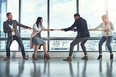 Buy stock photo Tug of war, business and people in office for battle, rivalry and healthy competition for growth. Team building, men and women in corporate workplace with rope, pull and challenge for staff in city