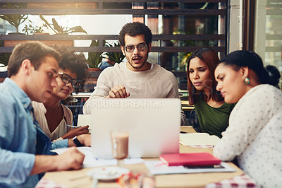 Buy stock photo Cropped shot of designers having a meeting at a coffee shop