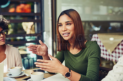 Buy stock photo Cropped shot of designers having a meeting at a coffee shop