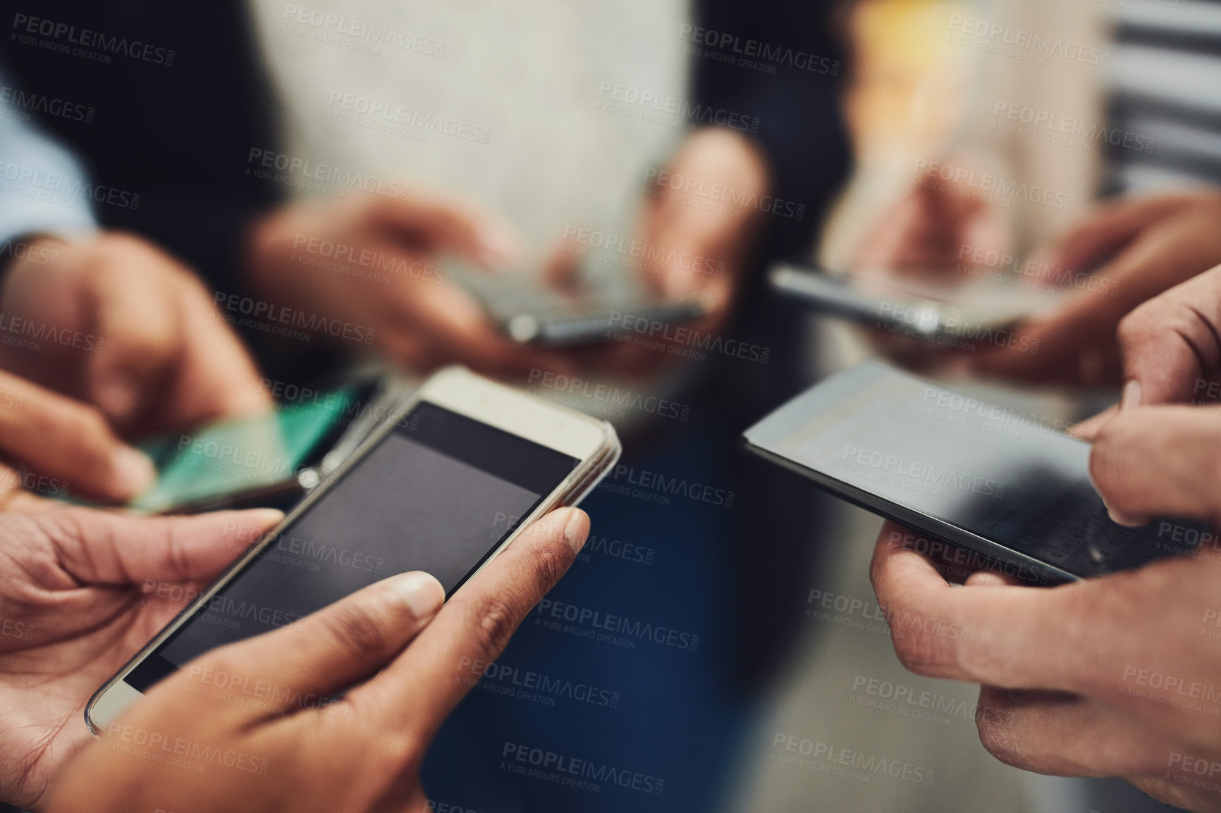 Buy stock photo Business people, phone and hands for networking, connection or communication together at office. Hand of group holding mobile smartphone in social media, data sync or sharing information at workplace