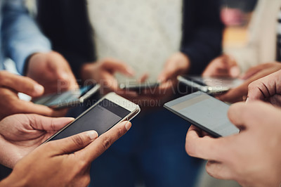 Buy stock photo Business people, phone and hands in networking, social media or data sync together at office. Hand of group holding mobile smartphone for connection, communication or sharing information at workplace