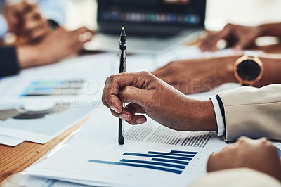 Buy stock photo Business people in a corporate finance meeting, planning with documents and going through company reports. Hands of professional accountants, employees and colleagues looking at accounting graph