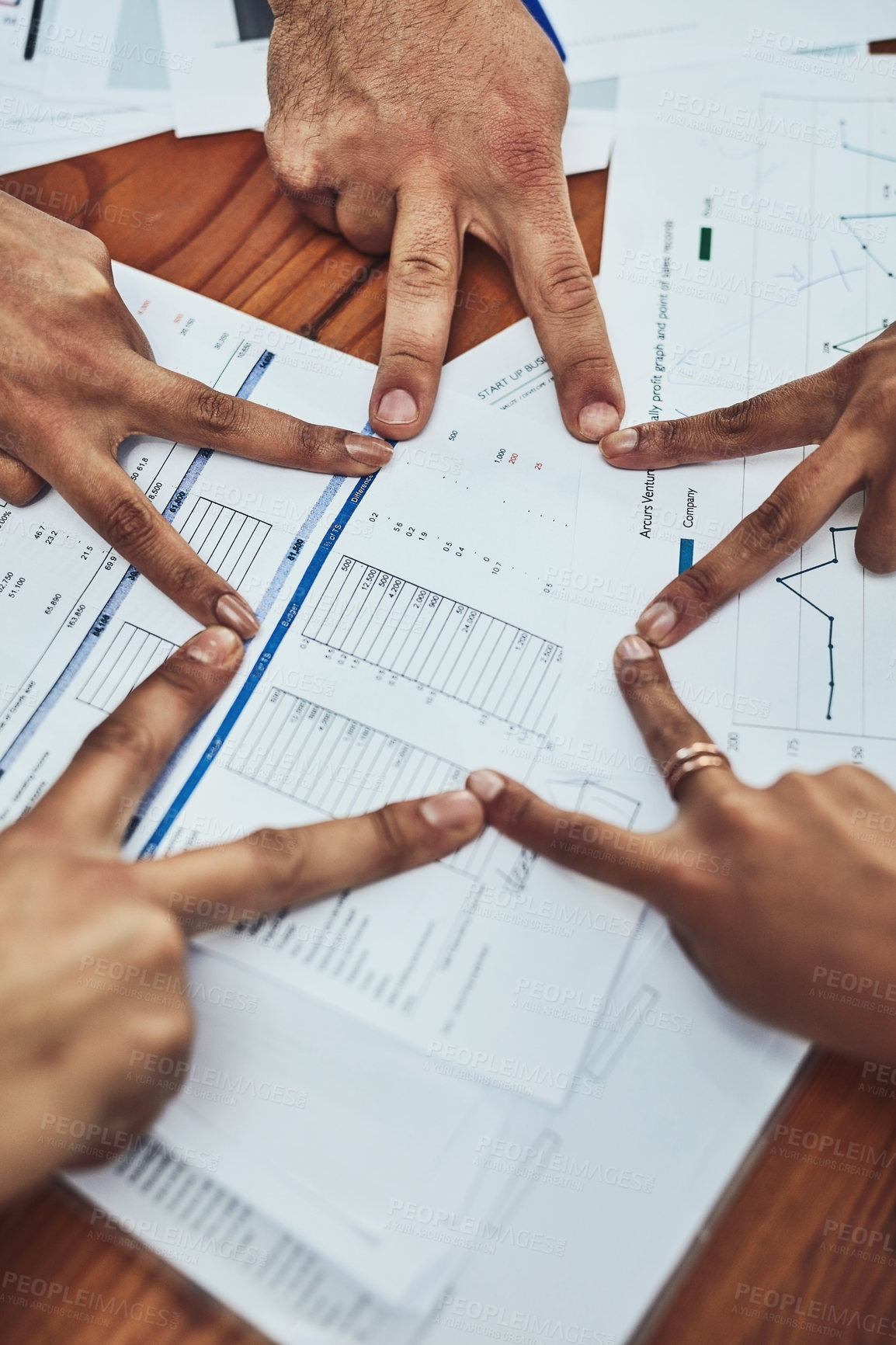 Buy stock photo Closeup shot of an unrecognizable group of businesspeople joining their fingers together in an office