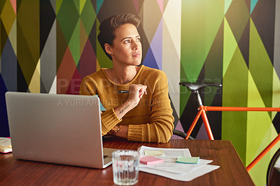 Buy stock photo Shot of a creative employee working in a modern office