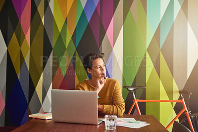 Buy stock photo Shot of a creative employee working in a modern office