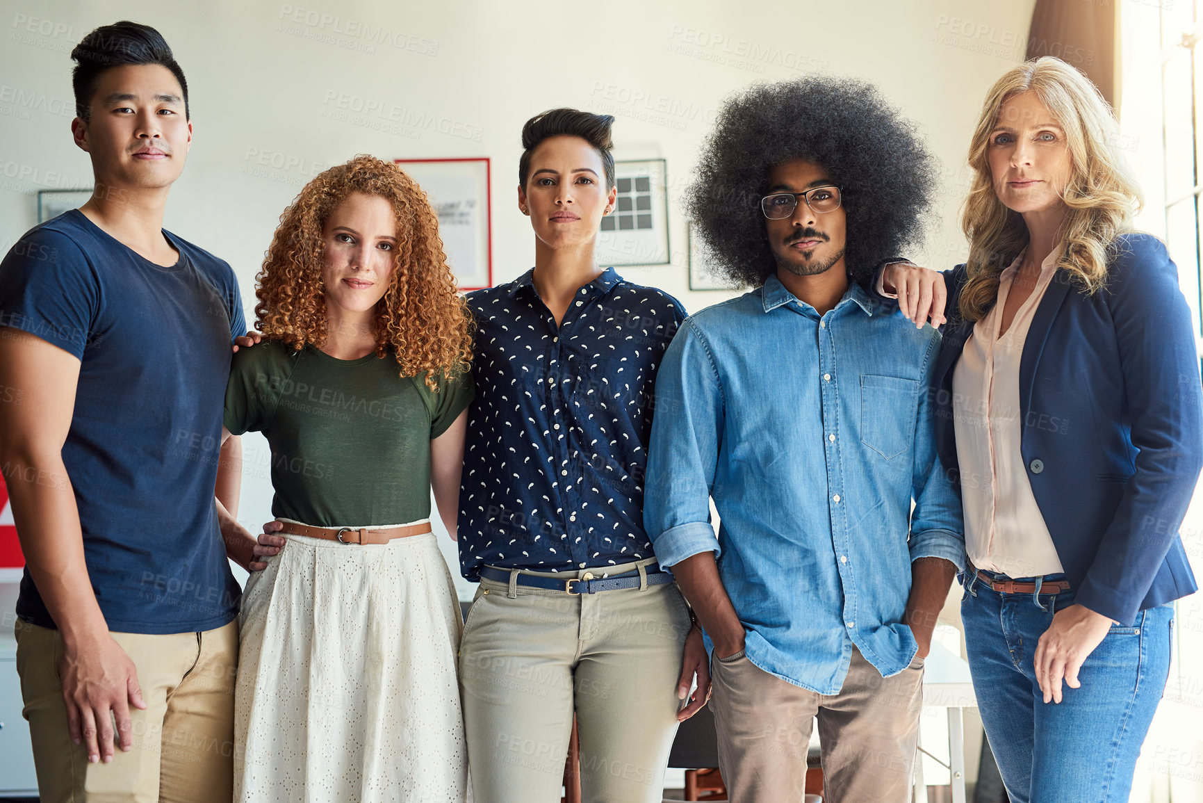 Buy stock photo Portrait of a group of diverse creative employees in a modern office