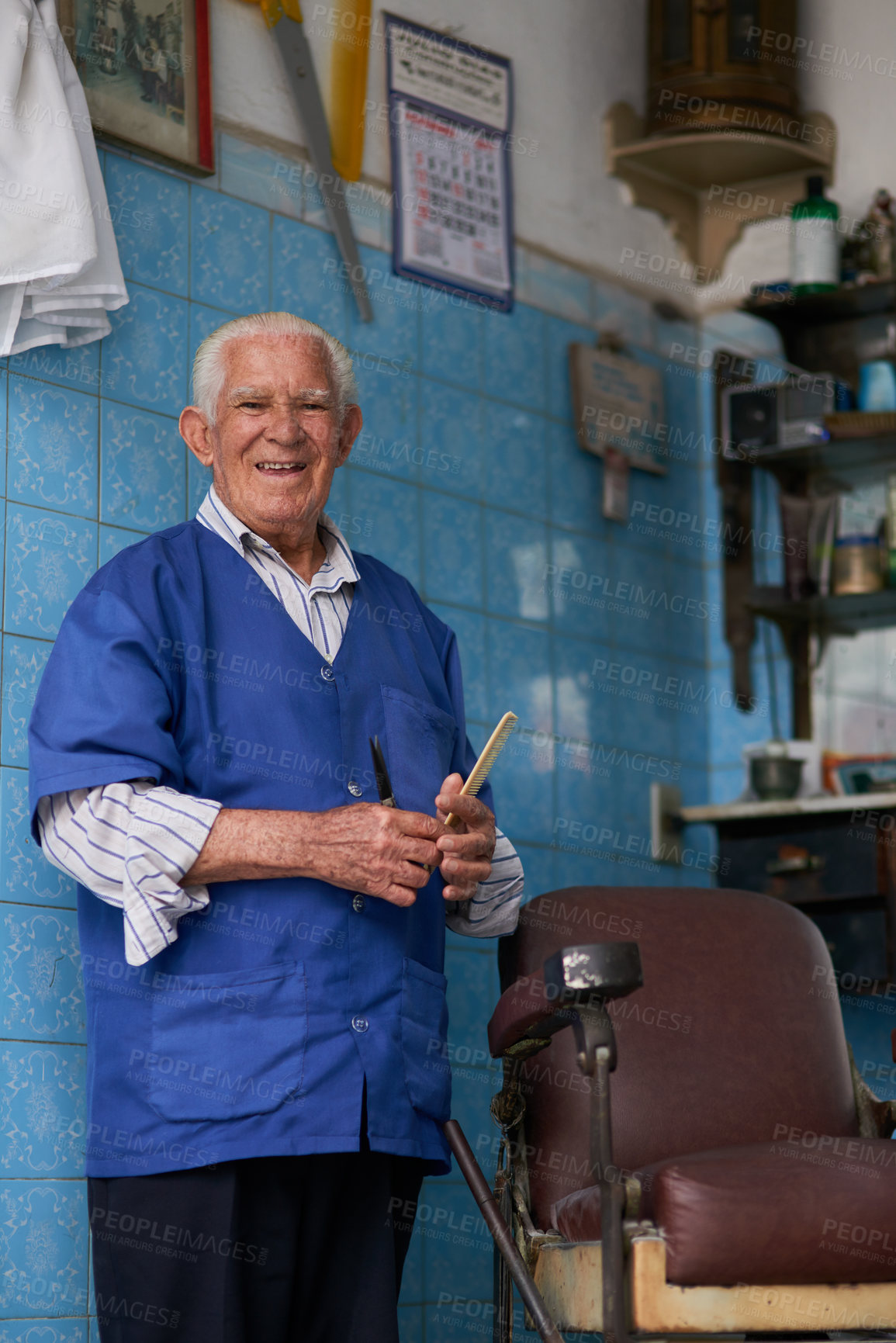 Buy stock photo Shot of a senior man in his barber shop