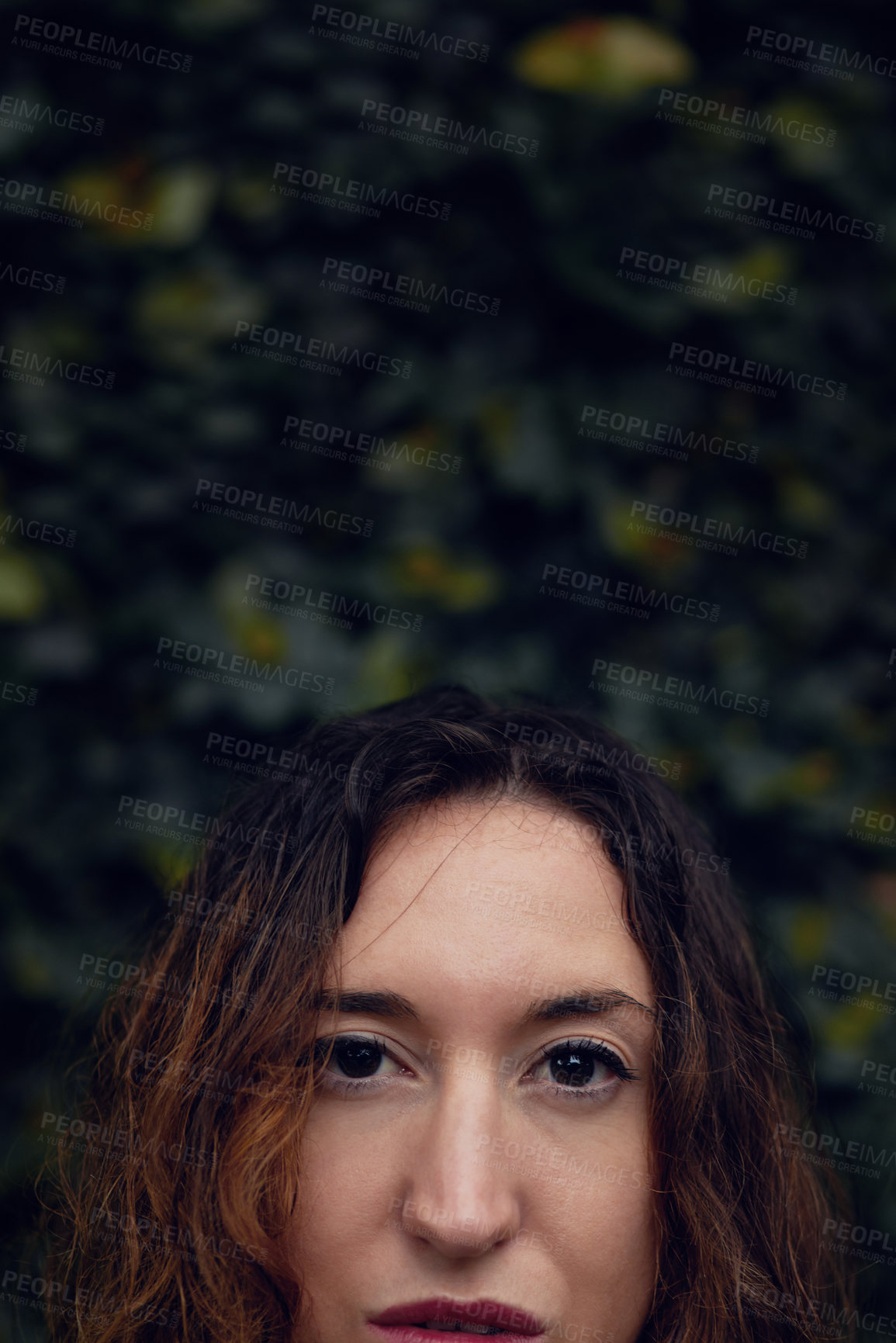 Buy stock photo Closeup shot of a beautiful young woman's face outside