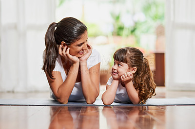 Buy stock photo Bonding, family and playful yoga by mother and daughter exercise on floor, meditation and wellness stretching in home Pilates, girl and mom with relax, peace and zen for holistic mind health in house