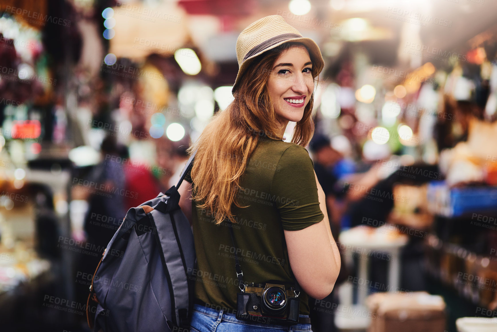 Buy stock photo Woman, tourist and portrait at market with backpack, smile or travel on journey, holiday and shopping. Girl, photographer and happy with camera at outdoor shop for deal, discount and excited in Italy