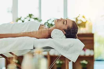 Buy stock photo Shot of an attractive young woman getting pampered at a beauty spa
