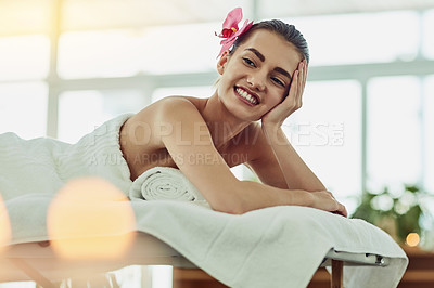Buy stock photo Shot of an attractive young woman getting pampered at a beauty spa