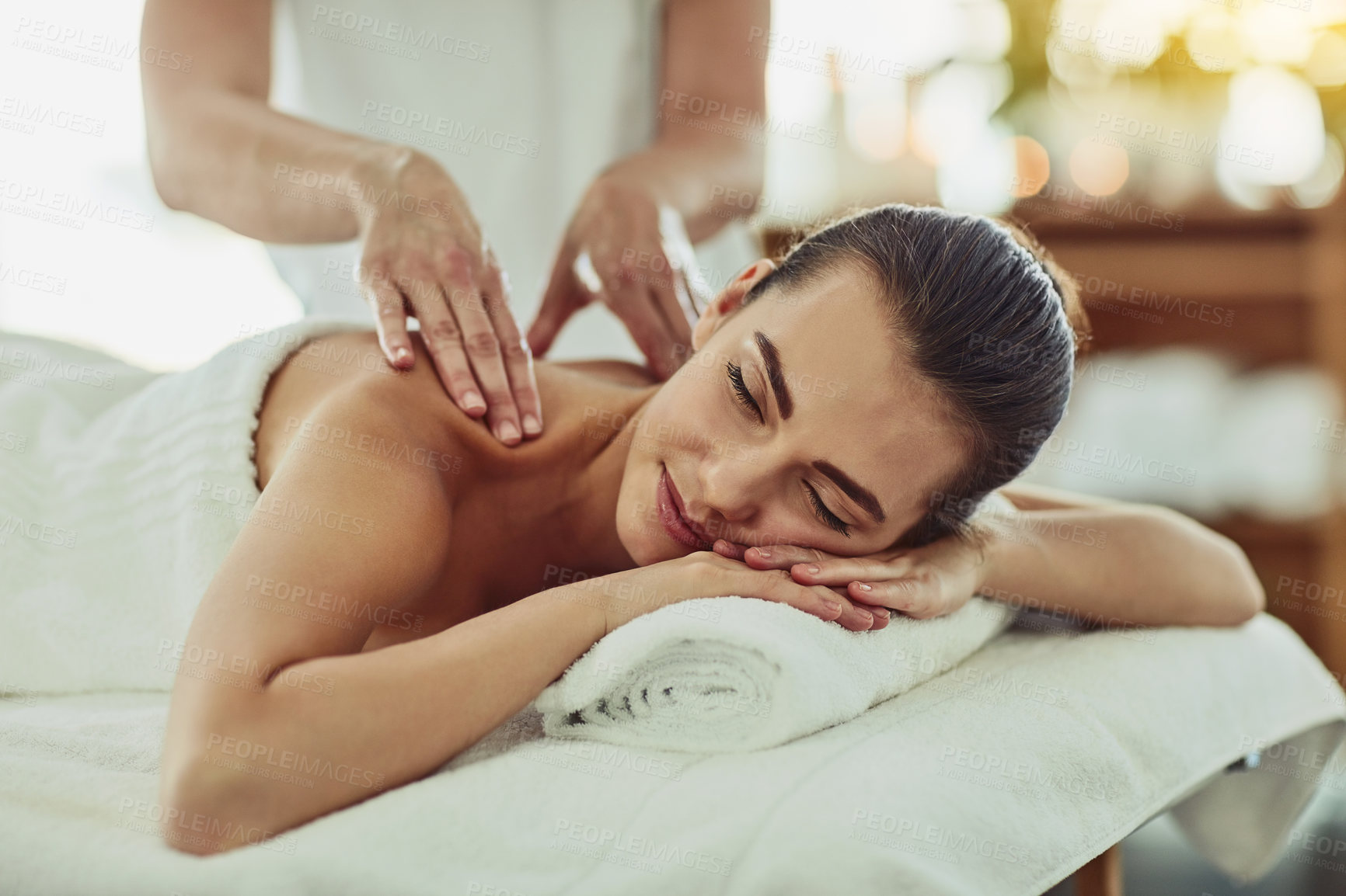 Buy stock photo Relax, happy and massage with woman in spa for wellness, luxury and cosmetics treatment. Skincare, peace and zen with female customer and hands of therapist for physical therapy, salon and detox