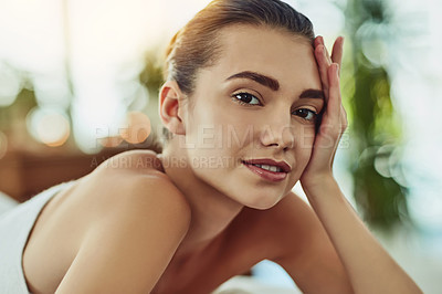 Buy stock photo Portrait of an attractive young woman getting pampered at a beauty spa