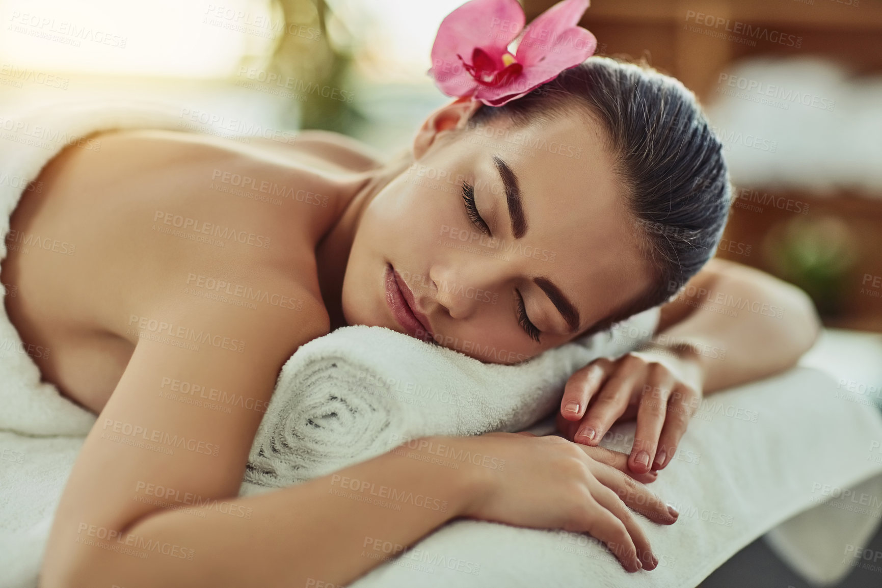 Buy stock photo Shot of an attractive young woman getting pampered at a beauty spa