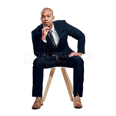 Buy stock photo Studio shot of a handsome young businessman posing against a white background