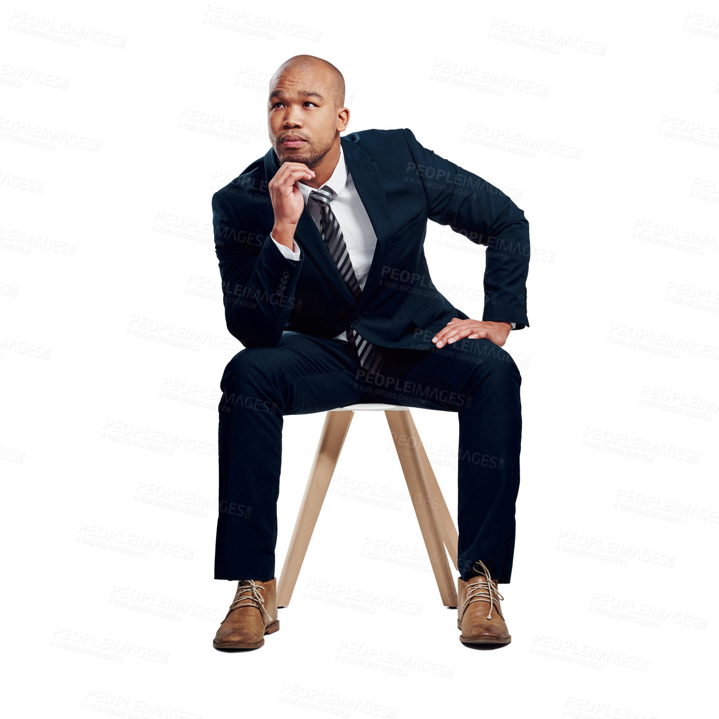 Buy stock photo Studio shot of a handsome young businessman posing against a white background