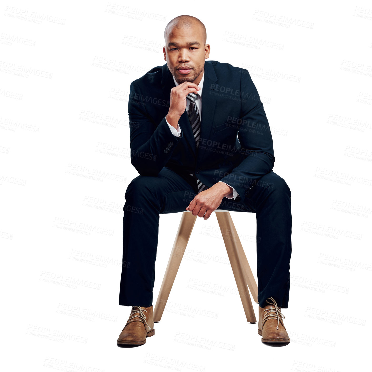 Buy stock photo Studio shot of a handsome young businessman posing against a white background