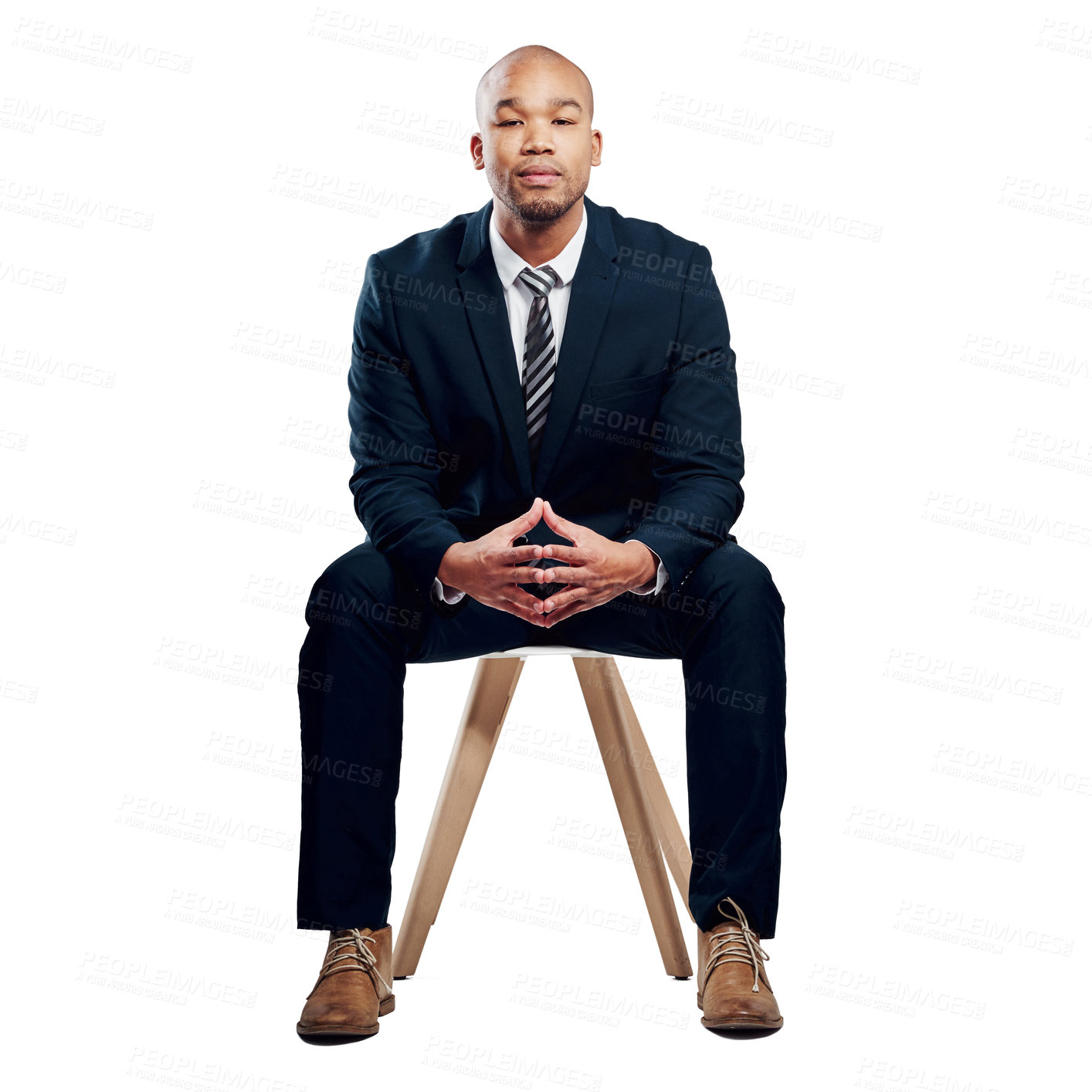 Buy stock photo Studio shot of a handsome young businessman posing against a white background