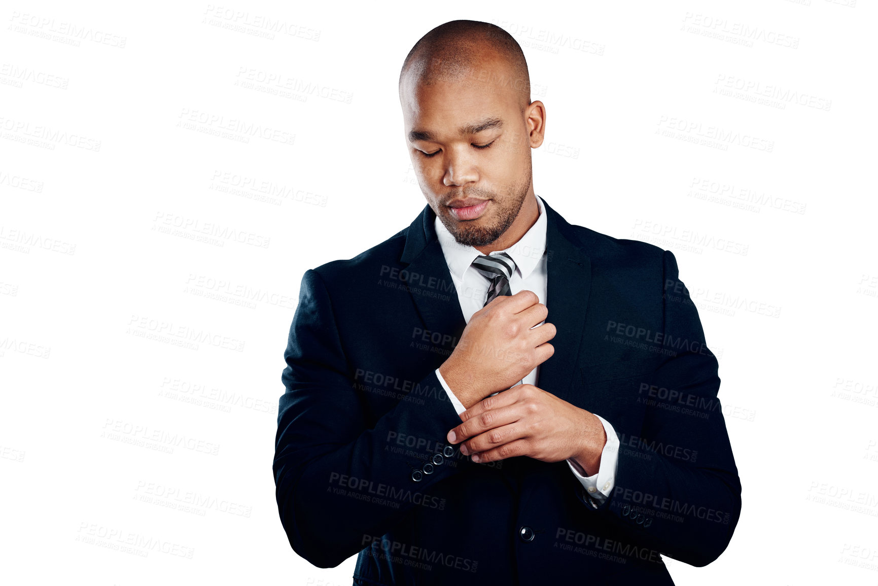 Buy stock photo Studio shot of a handsome young businessman fixing his sleeve against a white background