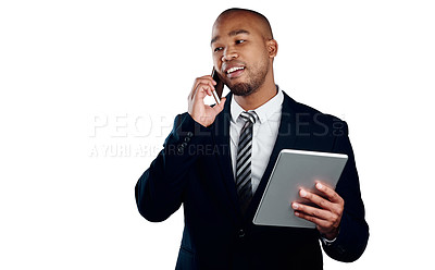 Buy stock photo Studio shot of a handsome young businessman on a call and using a tablet against a white background