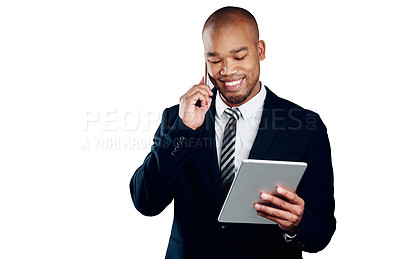 Buy stock photo Studio shot of a handsome young businessman on a call and using a tablet against a white background
