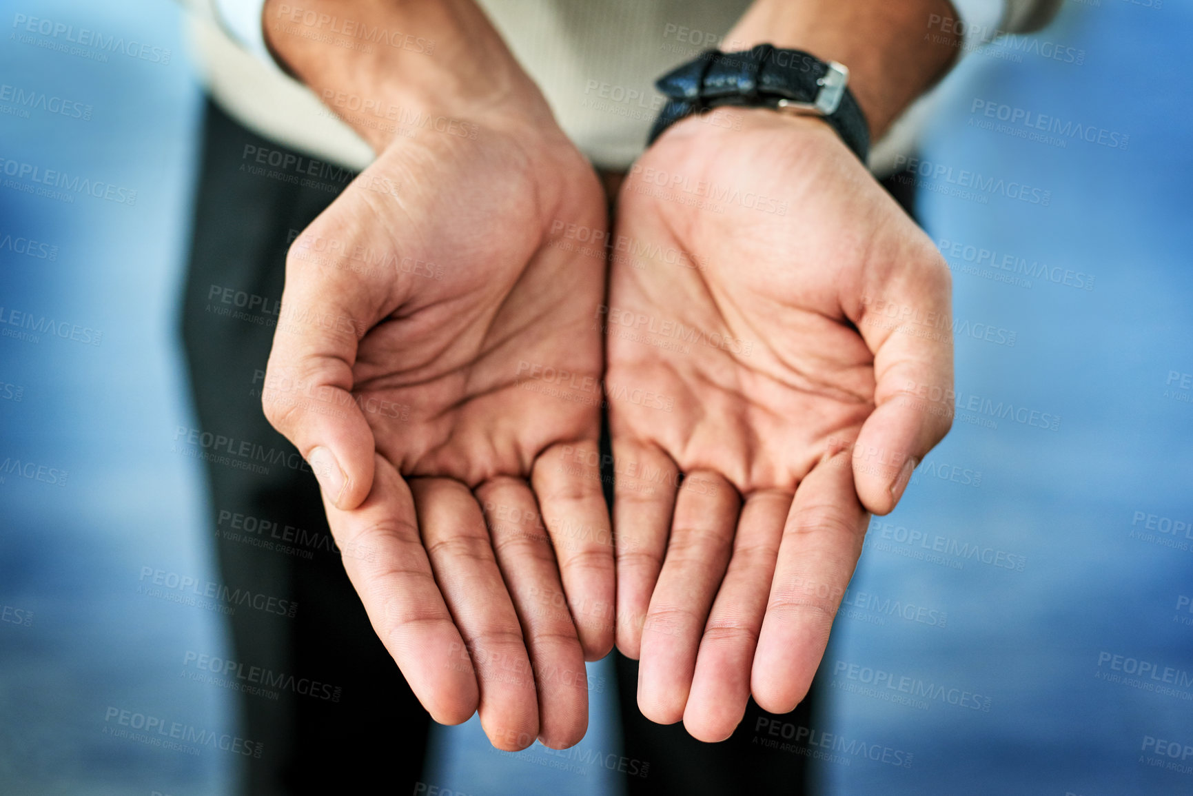 Buy stock photo Man, hands and charity with offer for donation, hope or kindness on a blue background. Closeup, male person or poor community with palms out for care, faith or prayer in gratitude or sustainability