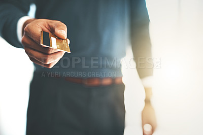 Buy stock photo Cropped shot of a businessman holding a credit card