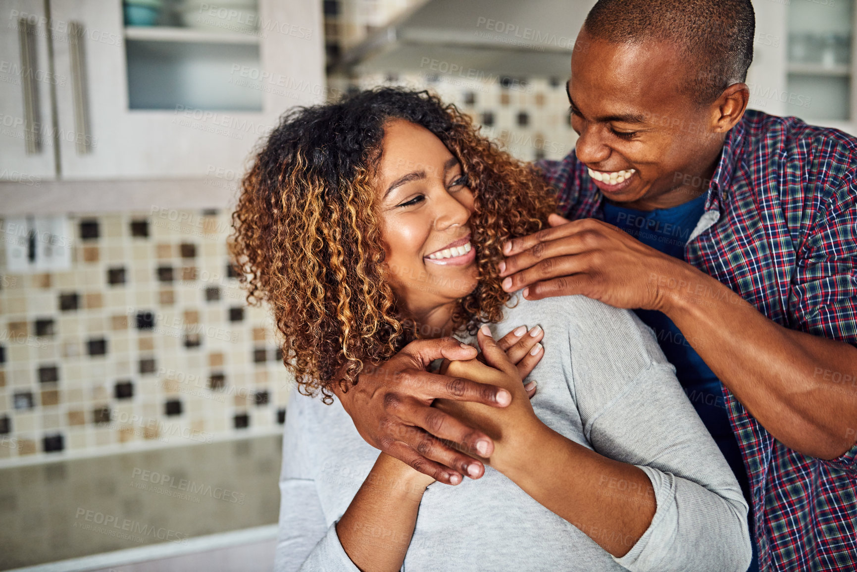 Buy stock photo Love, care and bonding with couple in kitchen of apartment for smile, happiness and support. Marriage, commitment and calm with man and woman at home for partner, wellness and trust together