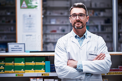 Buy stock photo Portrait of a mature pharmacist working in a pharmacy