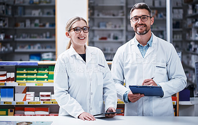 Buy stock photo Portrait of two pharmacists working in a pharmacy