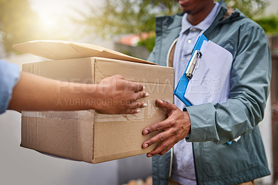 Buy stock photo Closeup shot of an unrecognizable courier making a delivery to a customer