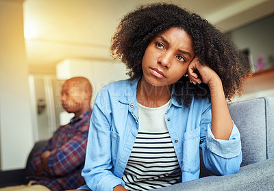 Buy stock photo Home, couple and arguing in living room on sofa for disagreement, problems and unhappy. Relationship, people and conflict or upset with confrontation at lounge on couch with regret and toxic