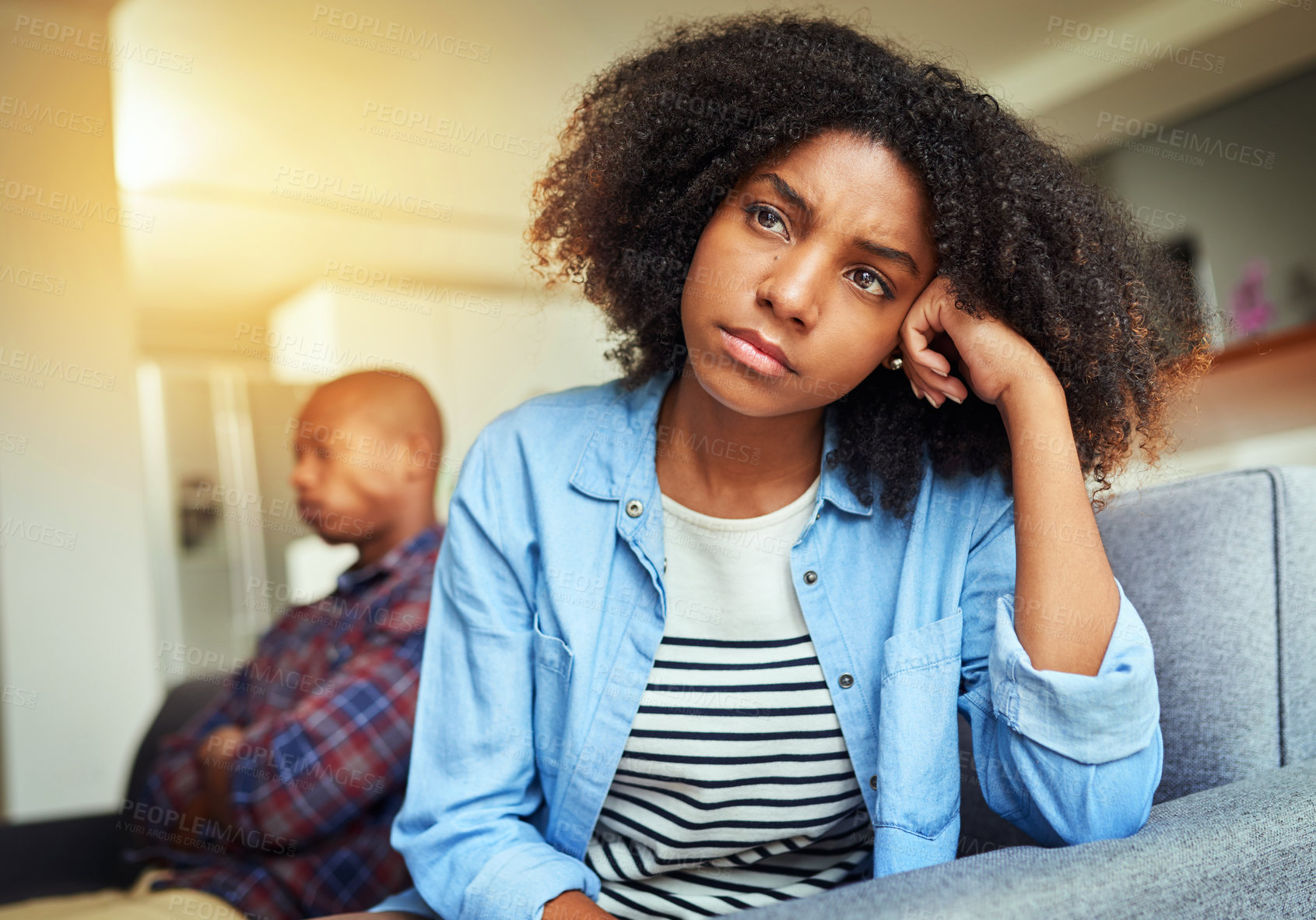 Buy stock photo Home, couple and arguing in living room on sofa for disagreement, problems and unhappy. Relationship, people and conflict or upset with confrontation at lounge on couch with regret and toxic