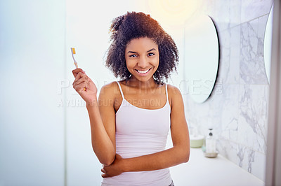 Buy stock photo Woman, smile and portrait with toothbrush in bathroom for oral hygiene, gum health and fresh breath. Home, happy and African person with dental care for cleaning, plaque removal and morning routine