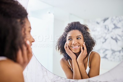 Buy stock photo Woman, skin and mirror in the bathroom with glow in the morning for facial treatment at home. Model, skincare and beauty with smile for self care with dermatology, reflection and happiness at home.