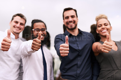 Buy stock photo Portrait of a group of businesspeople showing thumbs up together