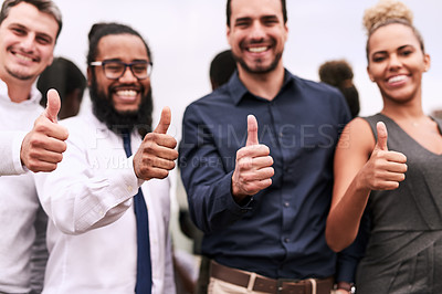 Buy stock photo Portrait of a group of businesspeople showing thumbs up together