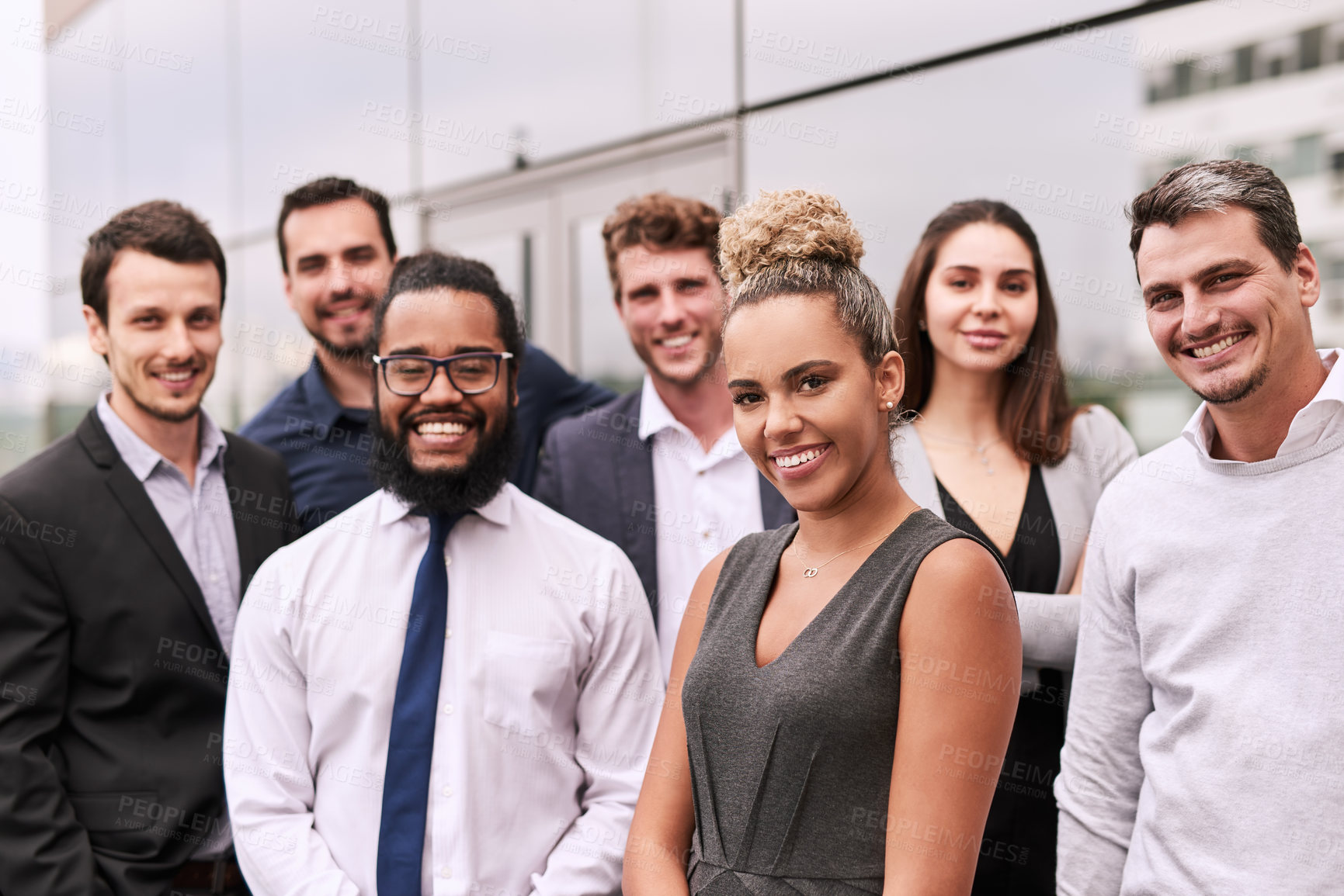 Buy stock photo Portrait of a group of businesspeople standing outside an office