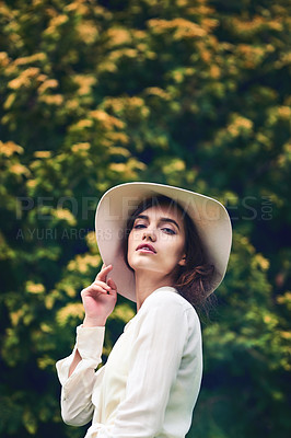 Buy stock photo Shot of a beautiful young woman spending a day in nature