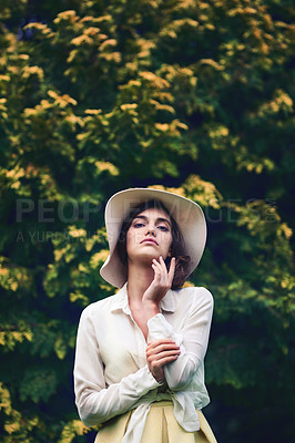 Buy stock photo Portrait of an attractive young woman wearing a stylish hat outdoors