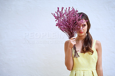 Buy stock photo Wall, bouquet and flowers with woman in portrait, surprise and present of lavender for valentines day. Hand, female person and hide with floral bunch for anniversary, scent gift plant or mockup space