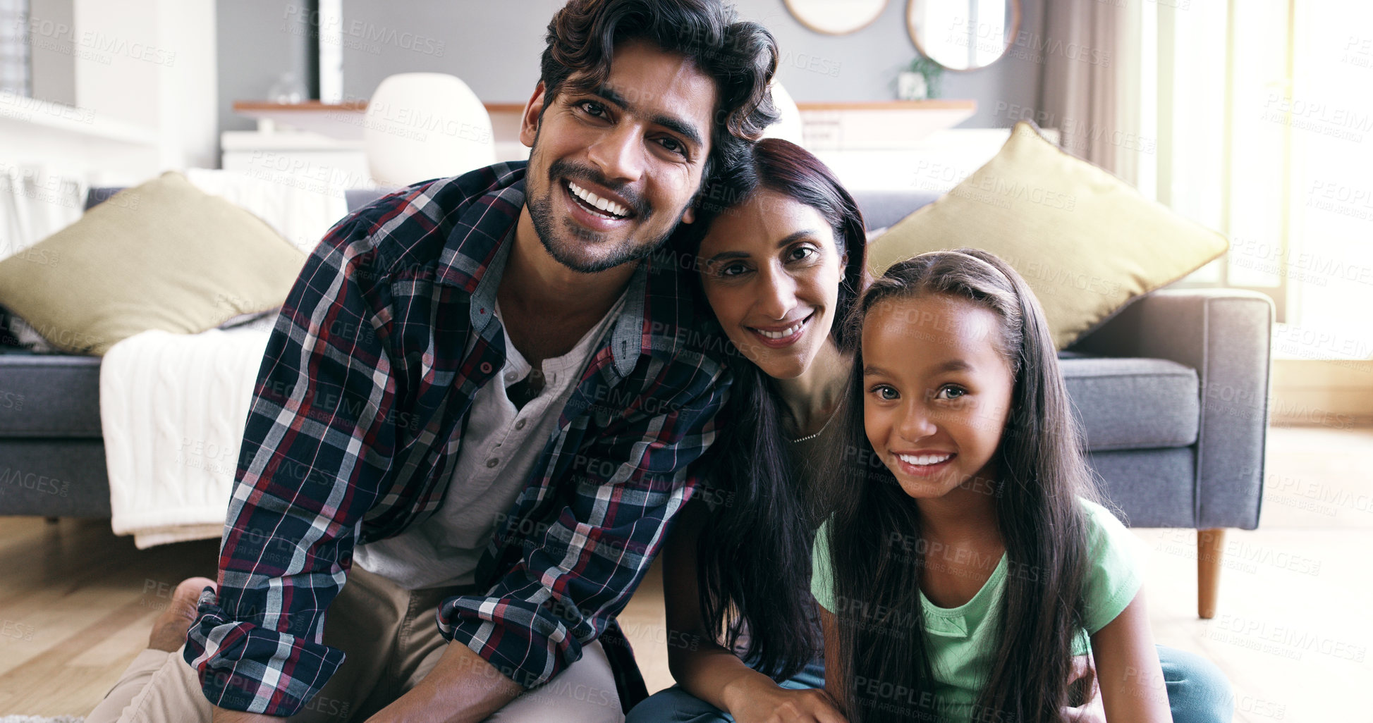 Buy stock photo Portrait of a young family at home