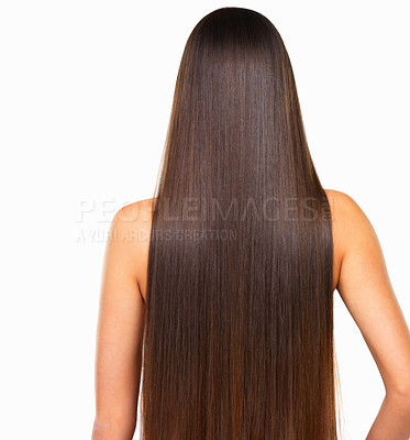 Buy stock photo Rearview studio shot of a young woman with long silky hair against a white background
