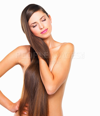 Buy stock photo Studio shot of a beautiful young woman posing against a white background