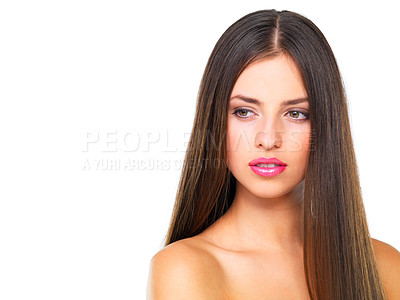 Buy stock photo Studio shot of a beautiful young woman looking thoughtful against a white background